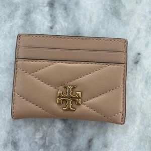 Nude Tory Burch card holder.